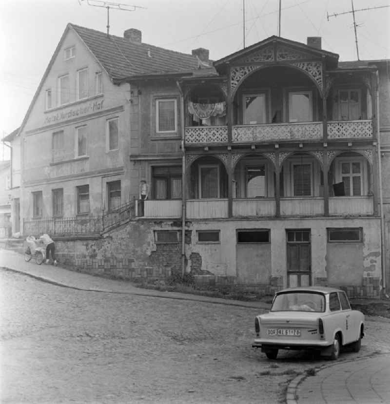 Street view of an apartment building - building front on street Hauptstrasse in Sassnitz in the state Mecklenburg-Western Pomerania on the territory of the former GDR, German Democratic Republic