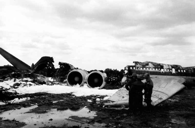 Wreck and junk debris of the passenger plane IL-62 at the crash site in Schoenefeld in the state Brandenburg on the territory of the former GDR, German Democratic Republic