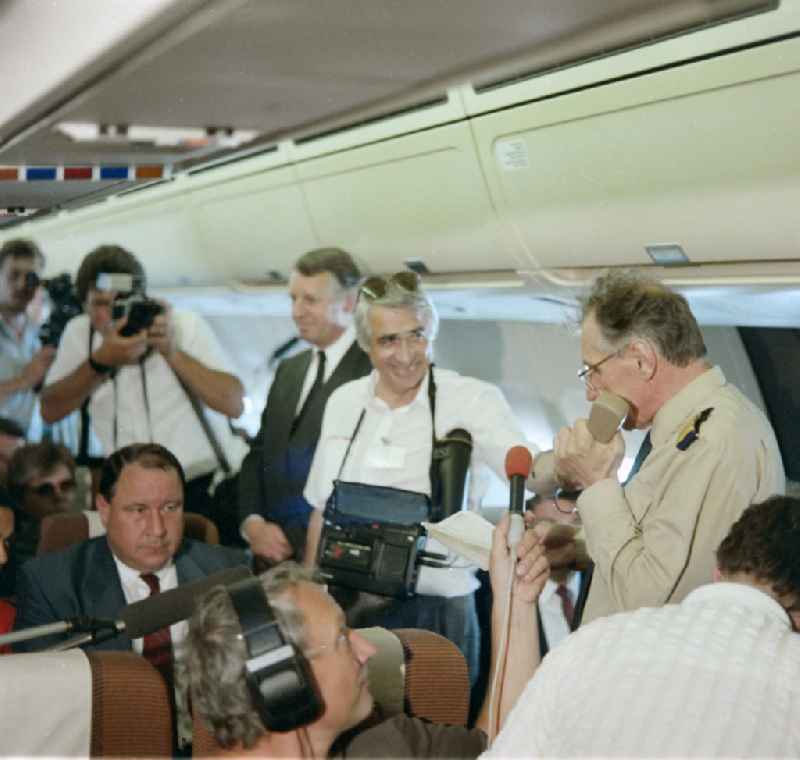 Lieutenant General Klaus Henkes in front of press representatives on board an INTERFLUG Airbus A31