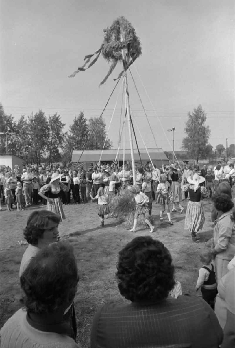 Residents and guests as participants in the events on the occasion of a village festival in Schoenwalde-Glien, Brandenburg on the territory of the former GDR, German Democratic Republic