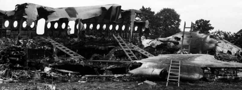 Wreck and junk debris of the passenger plane IL-62 at the crash site in Schoenefeld in the state Brandenburg on the territory of the former GDR, German Democratic Republic