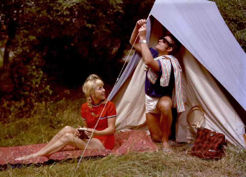 Man and woman camping in Schwielowsee, Brandenburg on the territory of the former GDR, German Democratic Republic