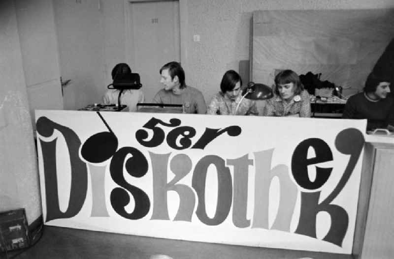 Young visitors of a dance discotheque in a school dance hall in einer Schule in Spremberg in the state Brandenburg on the territory of the former GDR, German Democratic Republic