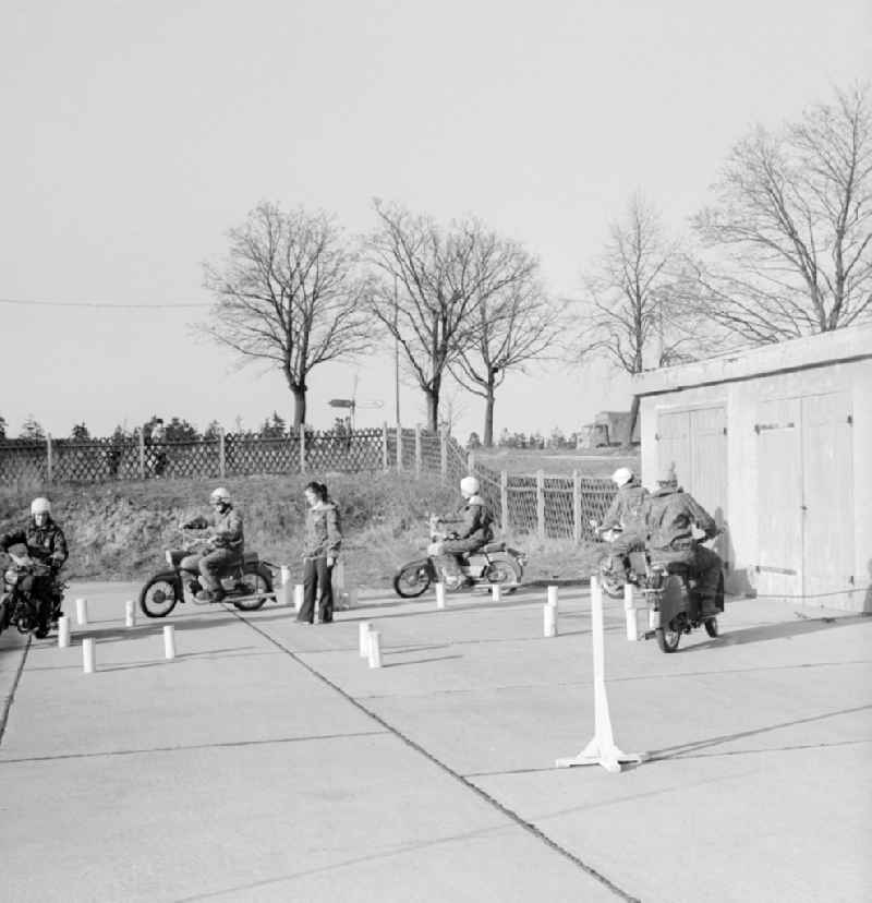 Skill training with the motorcycle section of Motorsport of Army Community (ASG) forward Strausberg in Strausberg in Brandenburg on the territory of the former GDR, German Democratic Republic