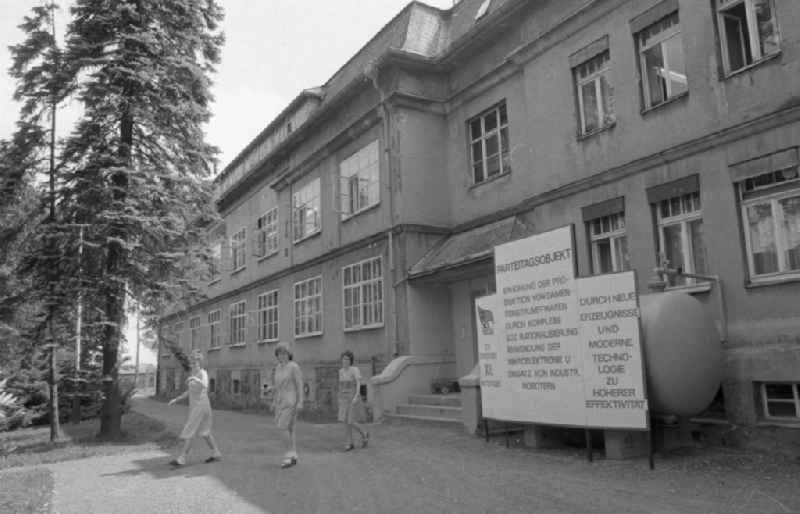 Outside - facade of the women's company of the stocking factory for the production of nylon - women's stockings as VEB fine stockings Esda in Thalheim in the Ore Mountains in the state of Saxony on the territory of the former GDR, German Democratic Republic