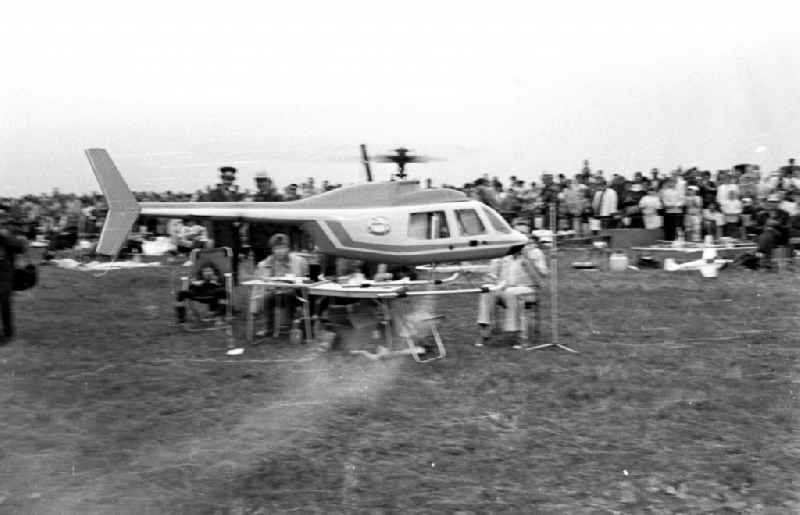 Visitors of the flight day at the Schoenhagen airfield in Trebbin in the state of Brandenburg in the former GDR German Democratic Republic