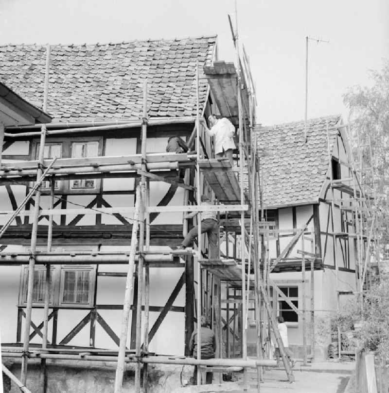 Restoration work on historic half-timbered houses in Treffurt in the state of Thuringia in the area of the former GDR, German Democratic Republic