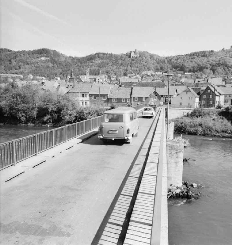 A vehicle on the Werra bridge in Treffurt in the state of Thuringia on the territory of the former GDR, German Democratic Republic
