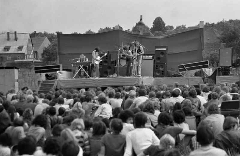 People at an open-air concert of the Puhdys in Wanzleben-Boerde, Saxony-Anhalt in the area of the former GDR, German Democratic Republic