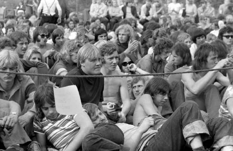 People at an open-air concert of the Puhdys in Wanzleben-Boerde, Saxony-Anhalt in the area of the former GDR, German Democratic Republic