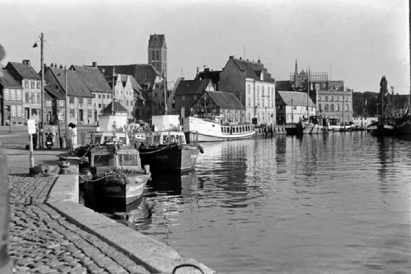 Harbor police ships lying at anchor and moored in the city harbor on Lagerstrasse in Wismar, Mecklenburg-Western Pomerania on the territory of the former GDR, German Democratic Republic