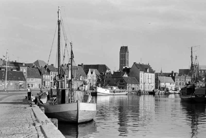 Harbor police ships lying at anchor and moored in the city harbor on Lagerstrasse in Wismar, Mecklenburg-Western Pomerania on the territory of the former GDR, German Democratic Republic