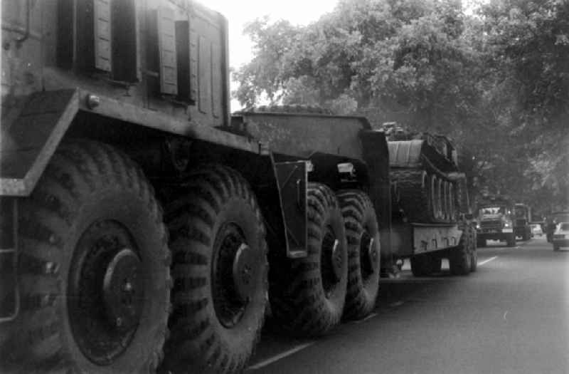 Tank weapon system of the military and combat technology of the GSSD 'Group of the Soviet Armed Forces in Germany' loaded onto a low loader in Wuensdorf in the federal state of Brandenburg in the area of the former GDR, German Democratic Republic