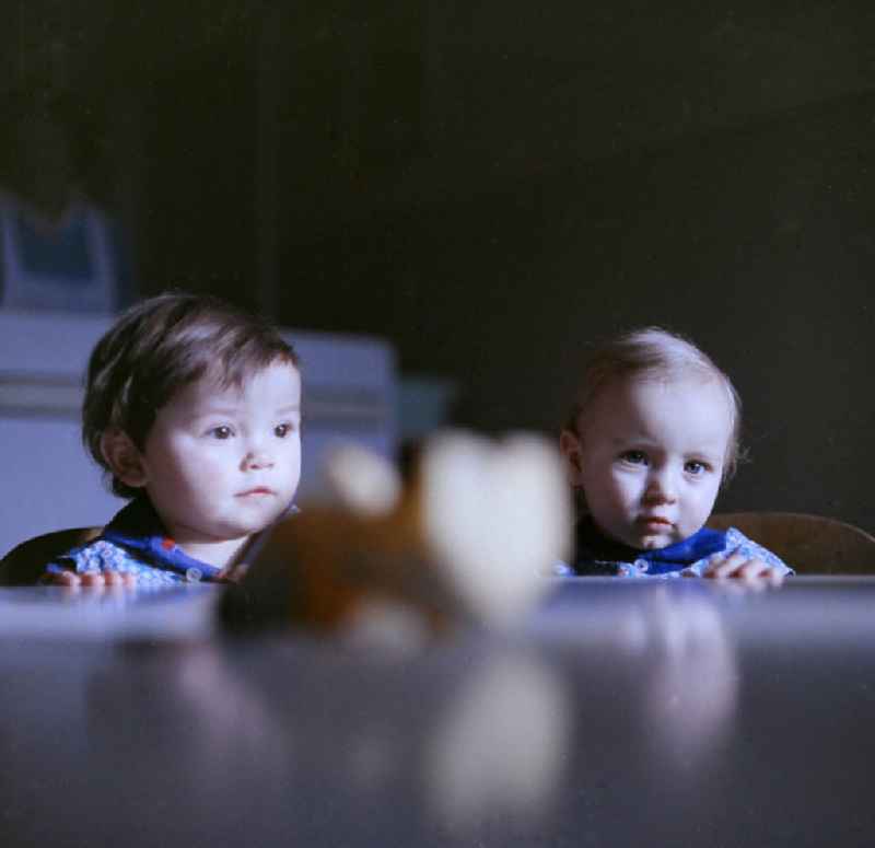 Children in a day-nursery with a toy in Zeitz in the state Saxony-Anhalt on the territory of the former GDR, German Democratic Republic