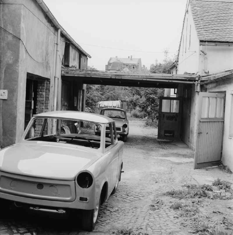 Courtyard with Trabants in Zittau in the state Saxony on the territory of the former GDR, German Democratic Republic