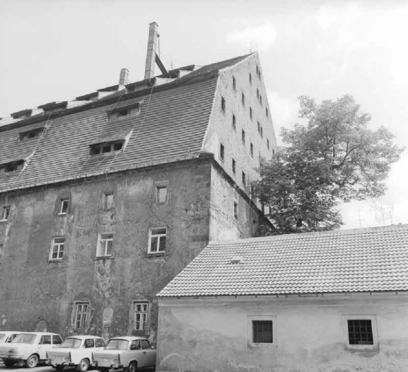 Old building with front damage in Zittau in the state Saxony on the territory of the former GDR, German Democratic Republic